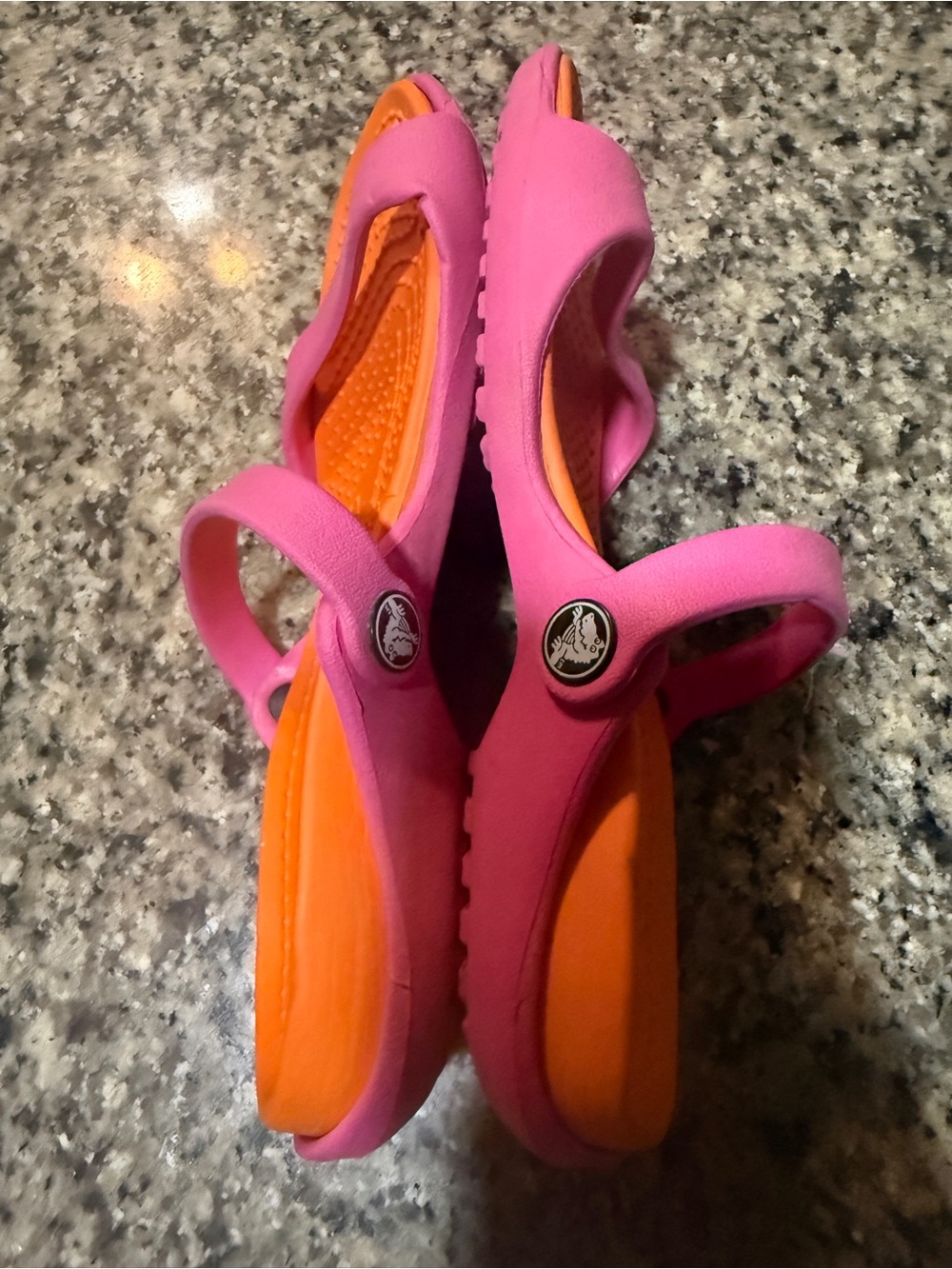 Crocs women’s 6' Pink and Orange Slingback Sandals